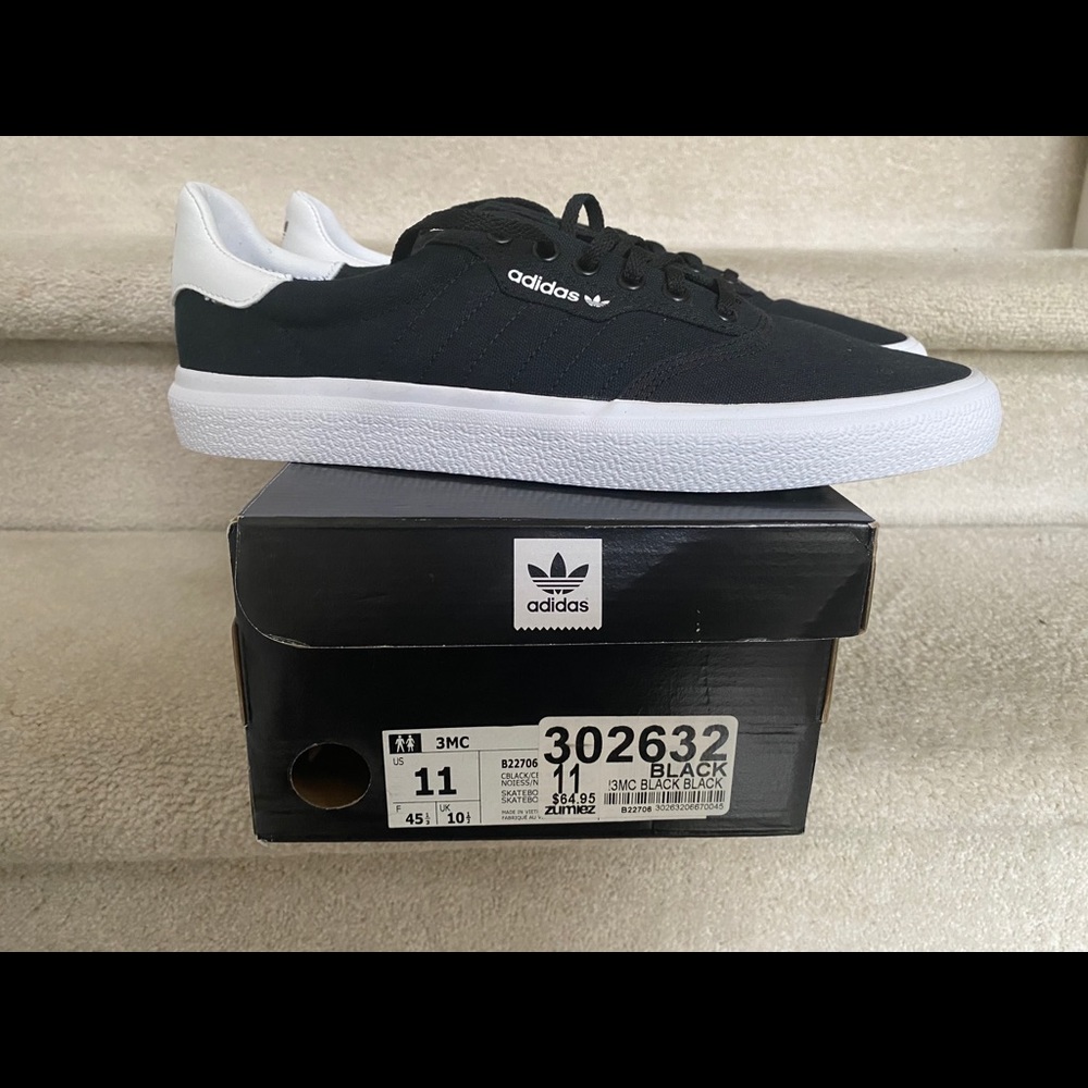 Men’s black Adidas. New With Tags